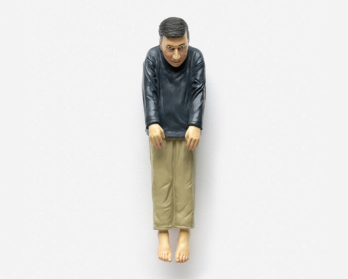 maurizio cattelan hides self-portrait miniatures across three cities for global treasure hunt