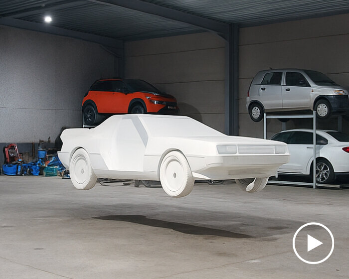 foam-made delorean car from back to the future hovers in the air using drone technology